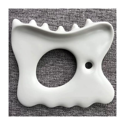 カスタマイズされたロゴ セラミック グア・シャ ツール マウスライン マッサージで筋肉のストレスと痛みを軽減します